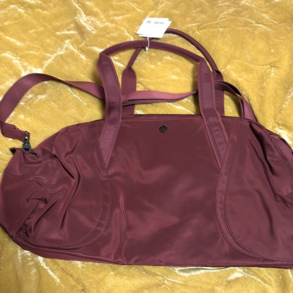 New WITHOUT tags Lululemon Out of Range Duffel bag - 24 wide x 12 high x 8 base